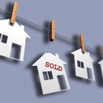 Conceptual paper house on washingline - 3d render